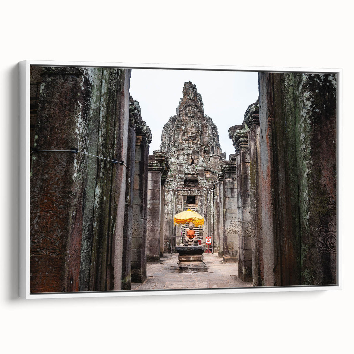 Vintage poster art of a Cambodian scenery on a framed canvas, featuring vibrant colors ideal for living room decor.