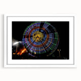 Abstract art print featuring a geometric pattern in muted gray and blue tones, framed with a white mat.