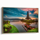 Framed canvas featuring a vintage-style landscape painting of an Indonesian scenery in muted gold and black tones.