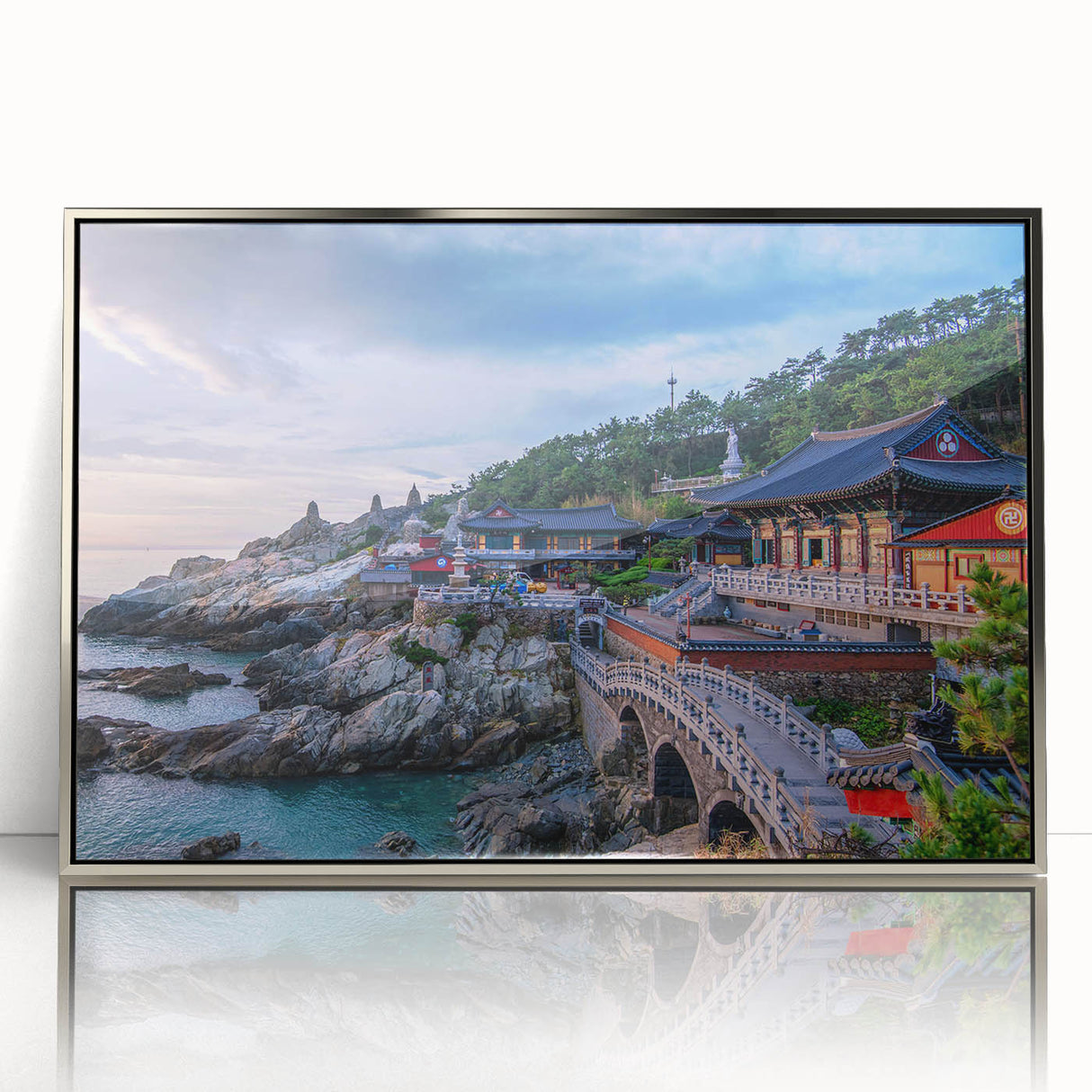 Mid-century modernist art depicting a serene Korean landscape in soft pastel hues on a silver-framed acrylic print.