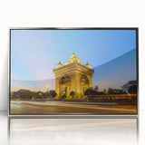 Mid-century modernist acrylic print of a Laos landscape, with muted earth tones, framed in silver.