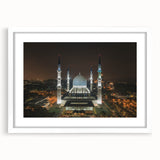 Abstract art print of a Malaysian landscape in muted earth tones on a framed canvas.