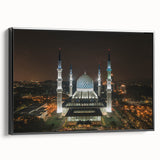 Black and white wall art featuring a vintage poster-style landscape of a Malaysian scenery on a framed canvas.