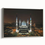 Vintage poster art of a Malaysian landscape on framed canvas, featuring black and colorful art tones.