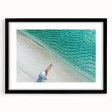 Extra large colorful art print of abstract Maldivian scenery in a black frame, ideal for living room decor.