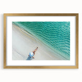 Extra large abstract art print of Maldives scenery in gold frame, featuring textured blue and white tones.