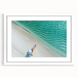 Abstract art print depicting a serene Maldivian landscape in cool blue and green tones, framed with a white mat.