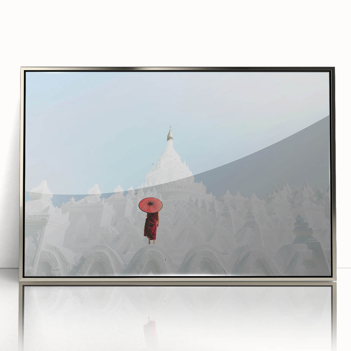 Mid-century modernist art depicting a serene Myanmar landscape in muted earth tones, framed in silver acrylic.