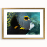 Abstract art print of a Caribbean scene in vibrant blue and green tones on a framed canvas, ideal for dining room decor.