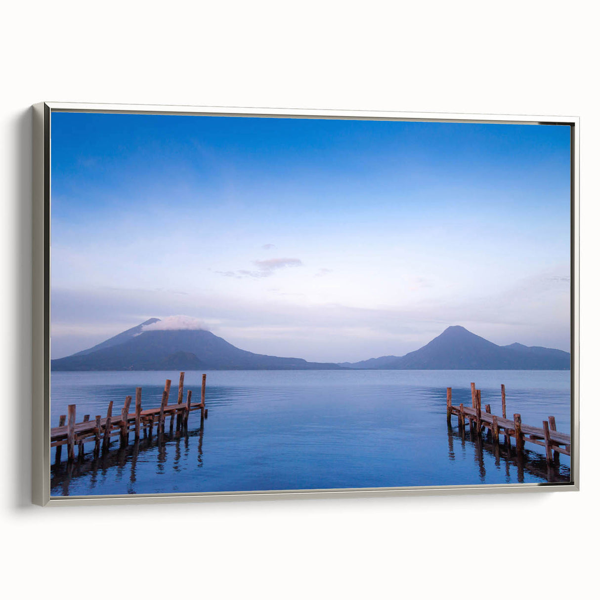 Framed canvas featuring a vintage-style landscape art painting of a Nicaraguan scenery in colorful and black tones.