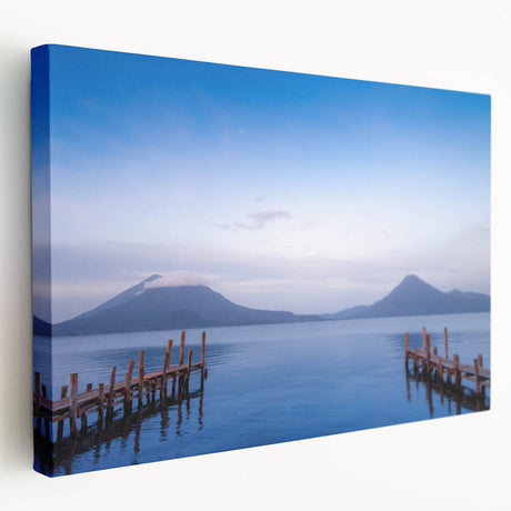 A stretched canvas print depicting a scenic view of Central America with vibrant green and blue tones.