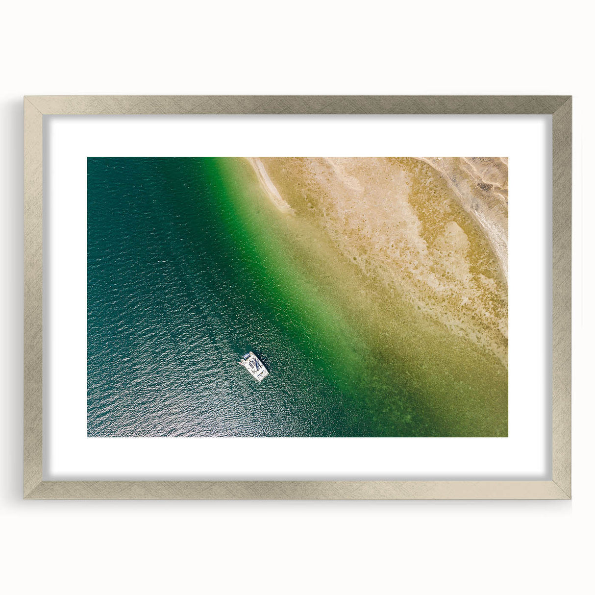 Textured abstract art print of Central American scenery in muted earth tones, framed in silver, ideal for bedroom decor.