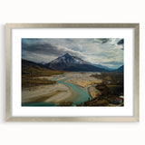Textured abstract art print of Albania scenery in muted earth tones on a framed silver mat, suitable for bedroom decor.