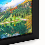 Black wall art featuring a textured, colorful Austrian landscape on a framed canvas, ideal for living room decor.