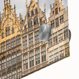 Large abstract wall art featuring a European scenery in muted earth tones on acrylic glass, ideal for dining room ambiance.