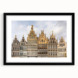 Extra large abstract art print featuring a colorful, textured European scenery in a black frame, ideal for living room decor.