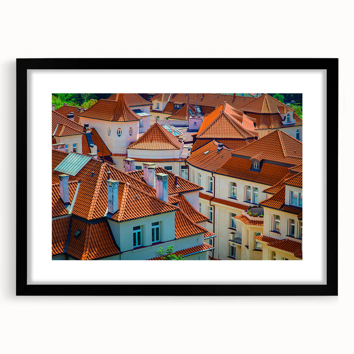 Colorful abstract art print of Prague scenery in vibrant hues on a large framed canvas, ideal for living room decor.