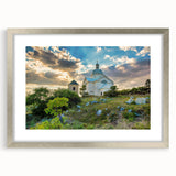 Extra large abstract art print depicting a textured European scenery in muted earth tones, framed in silver.