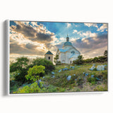 Vintage poster art of a European Czech Republic scenery on a framed canvas, with colorful art in black.