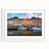 Textured abstract art print of a European scenery in muted earth tones, framed with a white mat.