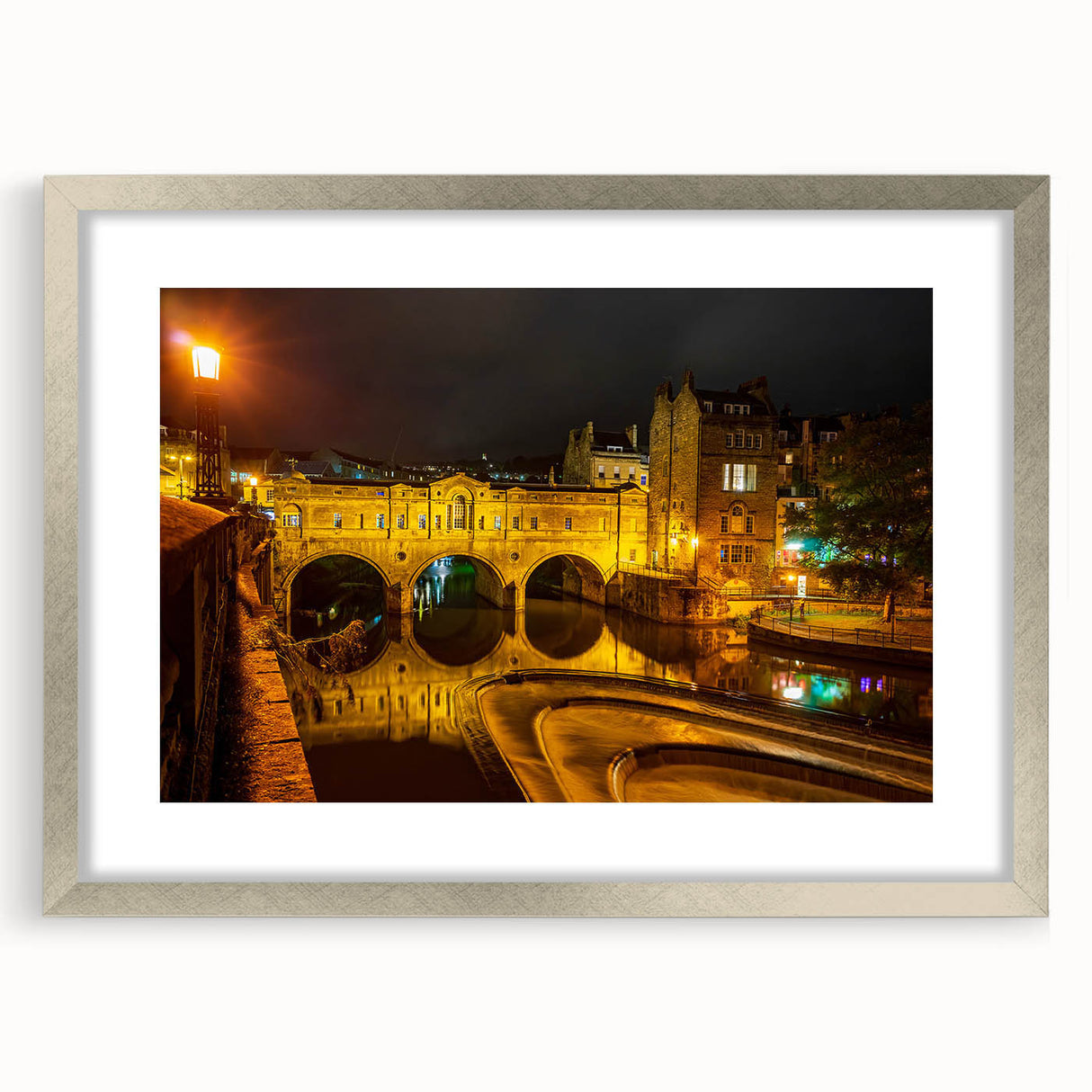Extra large abstract art print of a European scenery, featuring textured layers in muted earth tones, framed in silver.