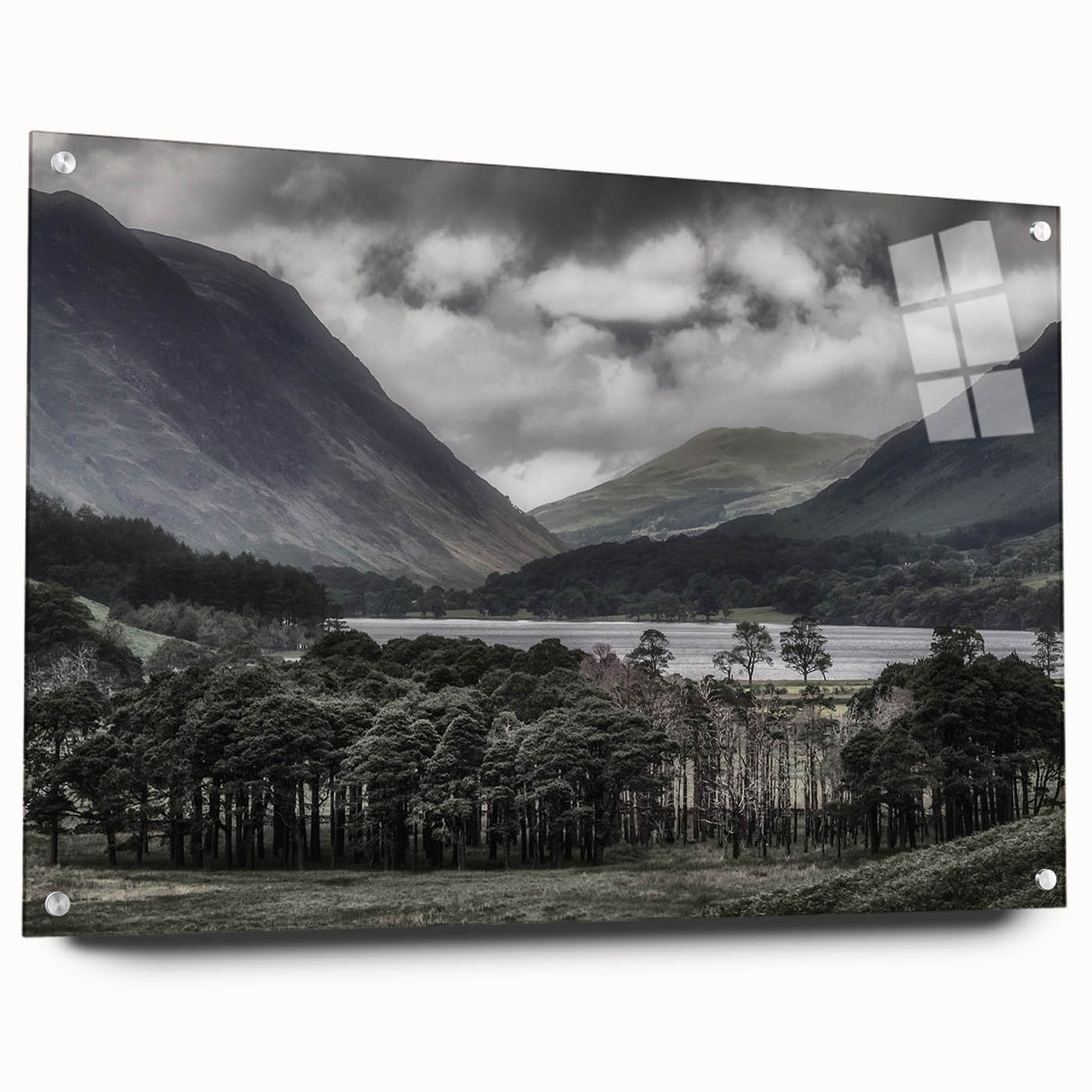 Acrylic print of Cumbria landscape with green fields and distant mountains, in muted earth tones.