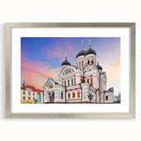 Extra large abstract art print of a textured European scenery in muted earth tones, framed in silver.