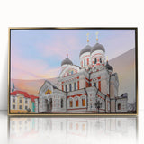 Art deco poster of a serene European landscape in muted gold and green tones, framed in acrylic.