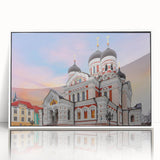 Mid-century modernist art of a European cityscape in muted gray and blue tones on a framed acrylic.