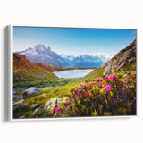 Vintage poster art of the French Alps in colorful hues on a large framed canvas, suitable for living room decor.