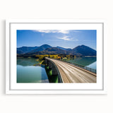 Textured art depicting a serene Bavarian landscape in muted green and blue tones, framed with a white mat.