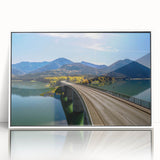 Mid-century modernist art depicting a Bavarian landscape in muted green and blue tones on a white acrylic framed poster.