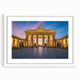 Textured abstract art print of Berlin scenery in muted earth tones on a framed white mat, suitable for bedroom decor.