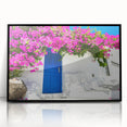 Large abstract wall art of Santorini with blue and white tones on acrylic, framed in black.