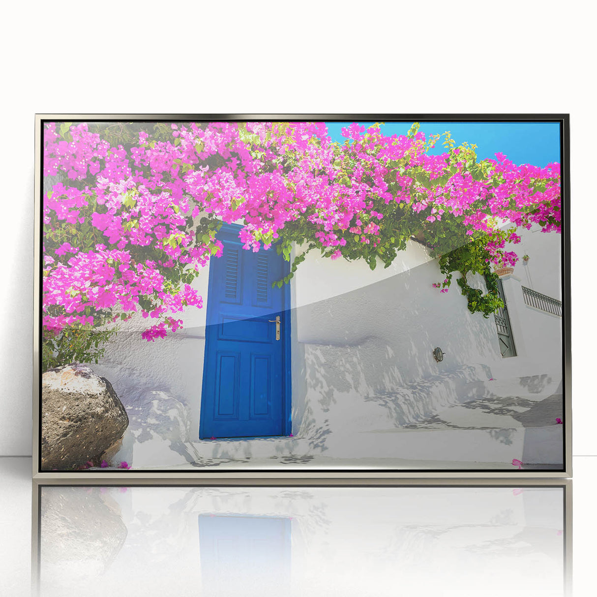 Framed acrylic print of Santorini scenery with muted blue and white tones, ideal for modern art wall decor.