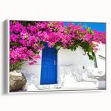 Extra large framed canvas featuring vintage poster art of Santorini, Greece, with colorful architecture and a black border.