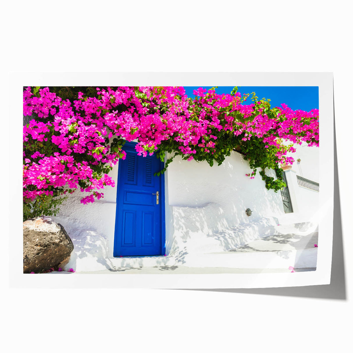 Rolled print of Santorini scenery with white buildings and blue domes, ideal for art wall dining room.