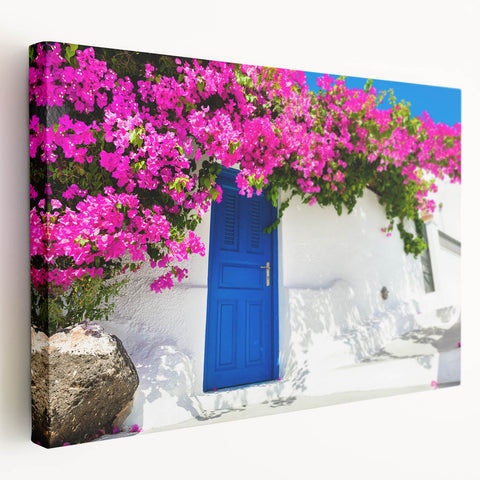 Large art of Santorini's white buildings against a blue sky on stretched canvas, suitable for kitchen wall art.