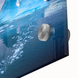 Large abstract wall art featuring a Greenland scenery in muted green and blue tones on acrylic glass.