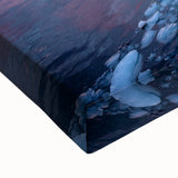 Large art depicting a black and white Greenland landscape on stretched canvas, suitable for bedroom wall placement.