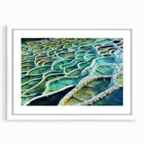 Textured abstract art print of a European scenery in muted earth tones on a white framed mat, suitable for bedroom decor.