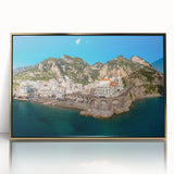 Art deco style poster of the Amalfi Coast in Italy, with vibrant blue and pastel yellow tones, framed in gold acrylic.