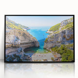 Large abstract wall art featuring a scenic Capri landscape in muted earth tones, framed in black acrylic.