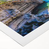 Art deco poster of Capri, Italy, featuring muted blue and white tones on rolled canvas, suitable for dining room wall art.