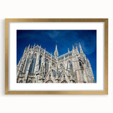 Abstract art print of Milan scenery in muted gold and gray tones, framed with mat, suitable for dining room decor.