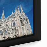 Black wall art featuring a textured depiction of Milan with vibrant colors on a framed canvas.