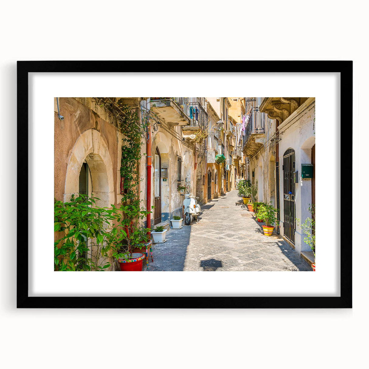 Extra large, textured abstract art print of colorful Sicilian landscape on a framed black mat, ideal for living room decor.