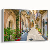 Vintage poster art of a Sicilian landscape on a framed canvas, featuring vibrant colors and a black border.
