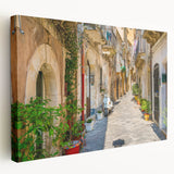 Scenic Sicily landscape on stretched canvas, featuring a coastal village with vibrant blue and white tones.