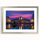 Extra large wall art featuring an abstract depiction of Venice in textured grays and blues, framed in silver.